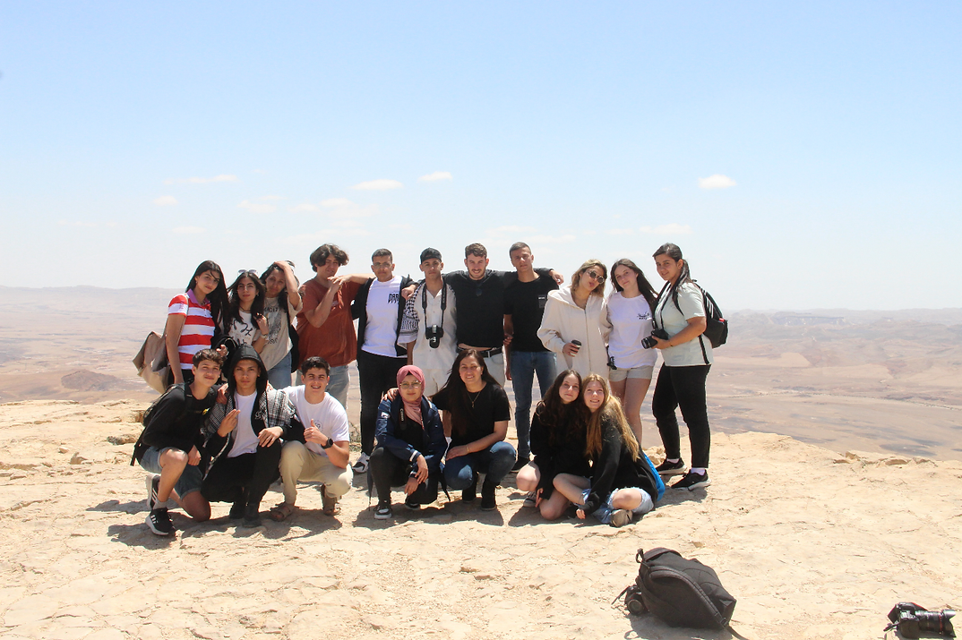 Group of youth posing outside